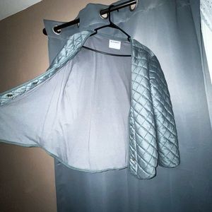 Arm length is too short. Never worn!!